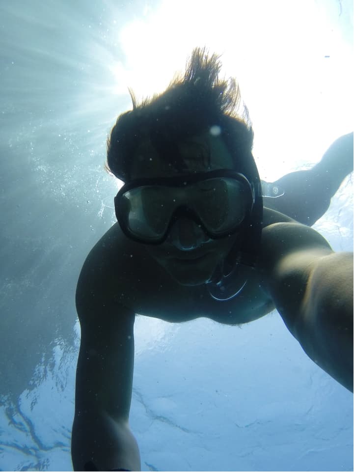 A guy doing snorkeling